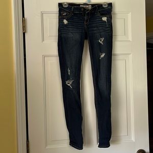 Hollister dark wash skinny jeans with small rips